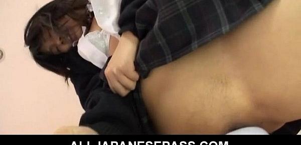  Japanese schoolgirl Hikaru Momose fingers her shaved pussy